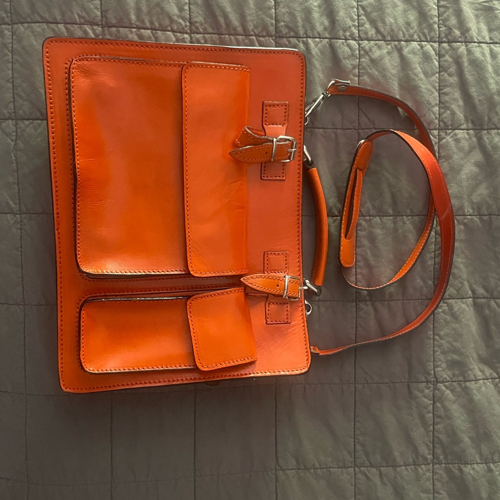 Vibrant Orange Leather Crossbody Bag with Structured Design
